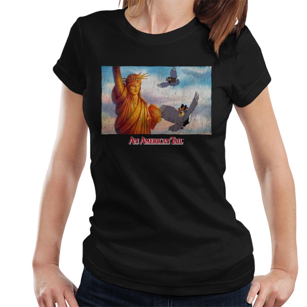 An American Tail Flying Henri Le Pigeon Near Statue Of Liberty Women's T-Shirt-ALL + EVERY