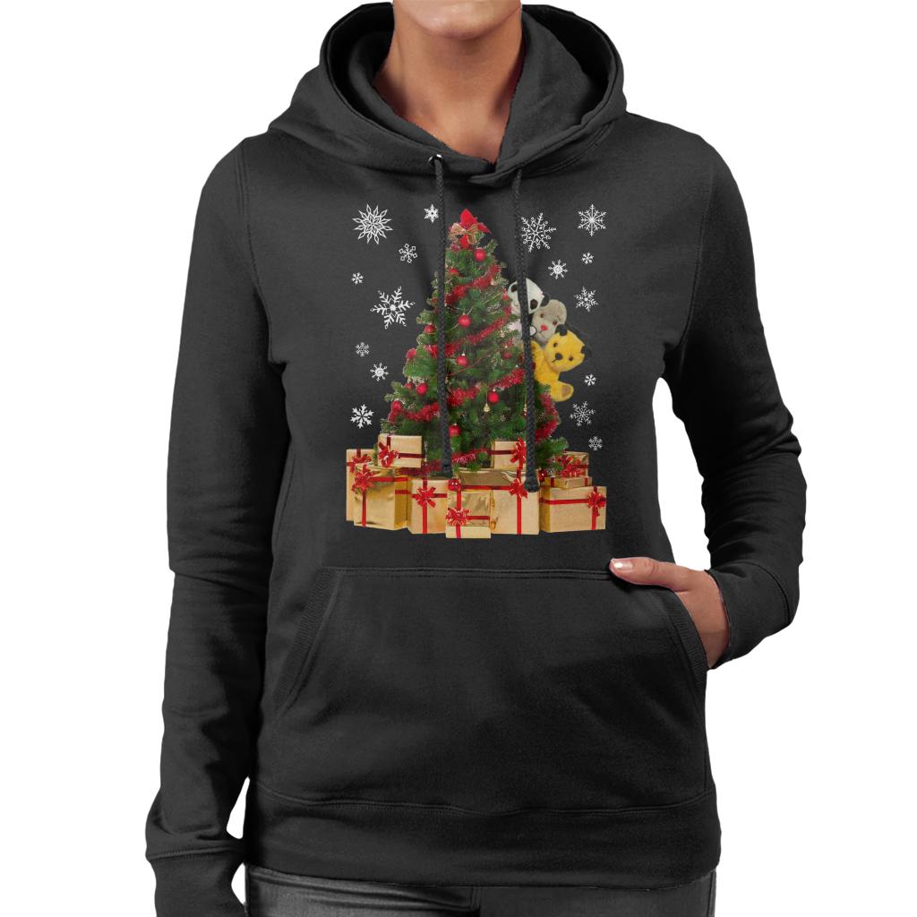 Sooty Christmas Characters Peeking Around Xmas Tree Women's Hooded Sweatshirt-ALL + EVERY